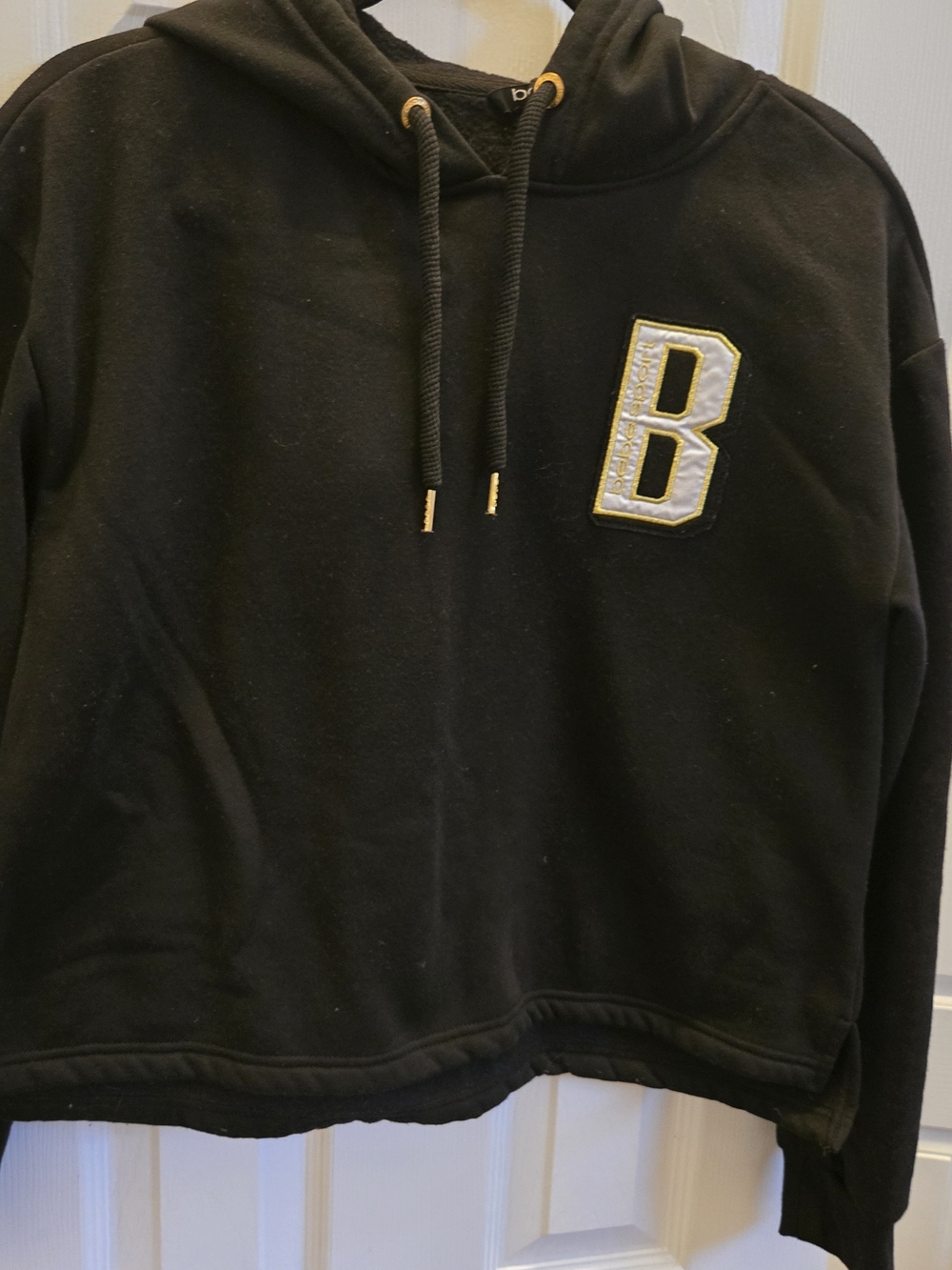 bebe Black Hoodie with Gold-Trim 'B' Patch